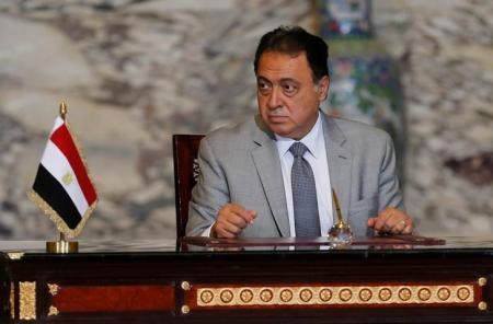 Egypt"s Minister of Health and Population Dr. Imad Eddin Ahmed Radi attends a signing of agreements ceremony with Egypt"s President Abdel Fattah al-Sisi and Sudanese President Omar Hassan al-Bashir at the El-Thadiya presidential palace in Cairo, Egypt.